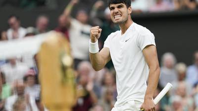 Defending Wimbledon champion Carlos Alcaraz comes back to beat Frances Tiafoe in the third round
