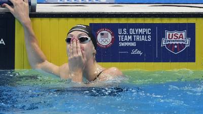 Gretchen Walsh sets a world record in the 100-meter butterfly at the U.S. Olympic trials