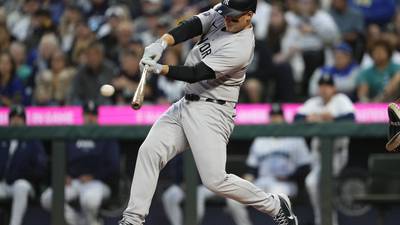 Yankees clinch playoff berth by beating Mariners 2-1 in 10 innings