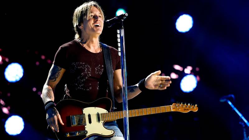 Keith Urban performing on stage