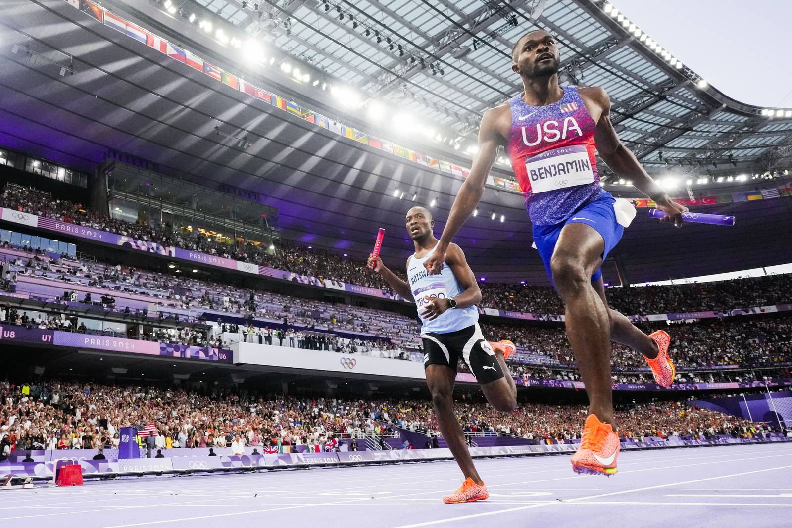 Benjamin of US holds off Tebogo of Botswana to win men's 4x400 relay at