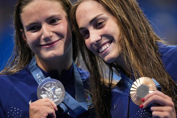 American swimmers grabbed plenty of hardware Monday at the Olympics, but no gold