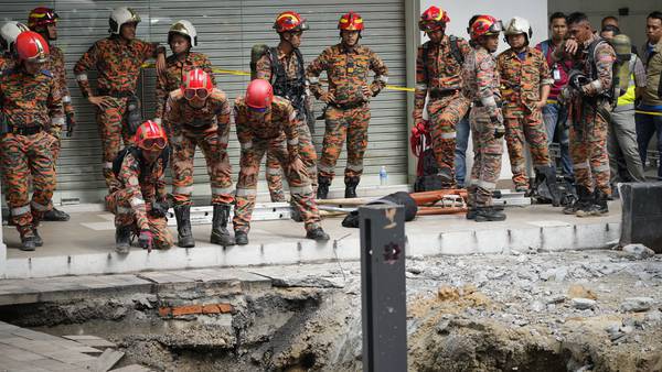 Woman from India disappears down a sinkhole in Malaysia's capital