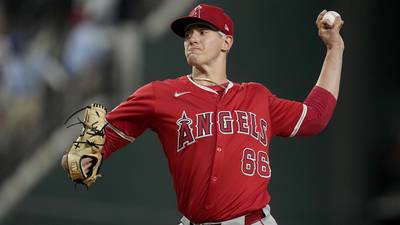 Italian rookie Sam Aldegheri gets 1st major league victory, helping the Angels beat the Rangers 5-1